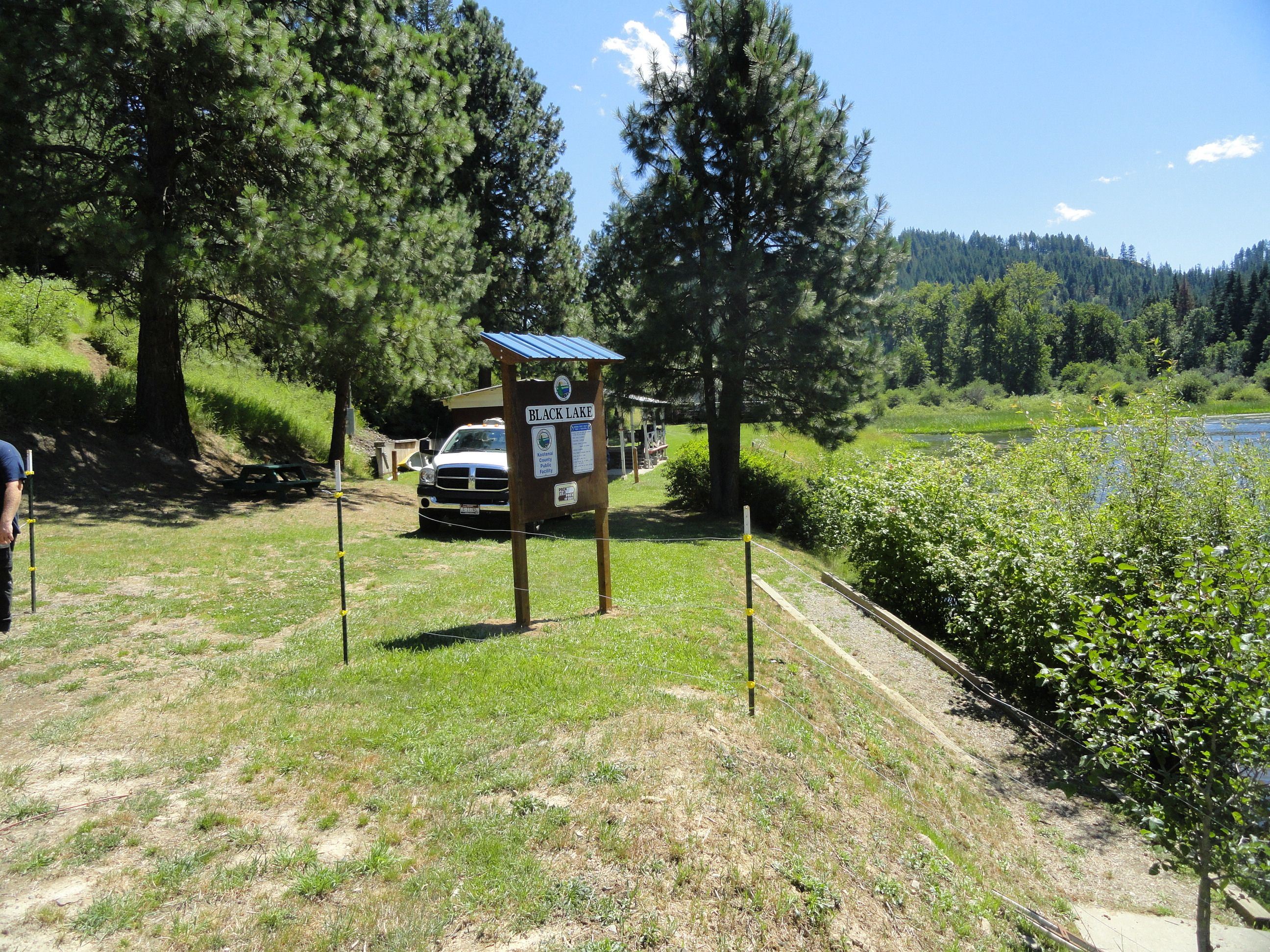 Black Lake sign and shore