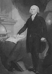 Black and white image of a man in an office